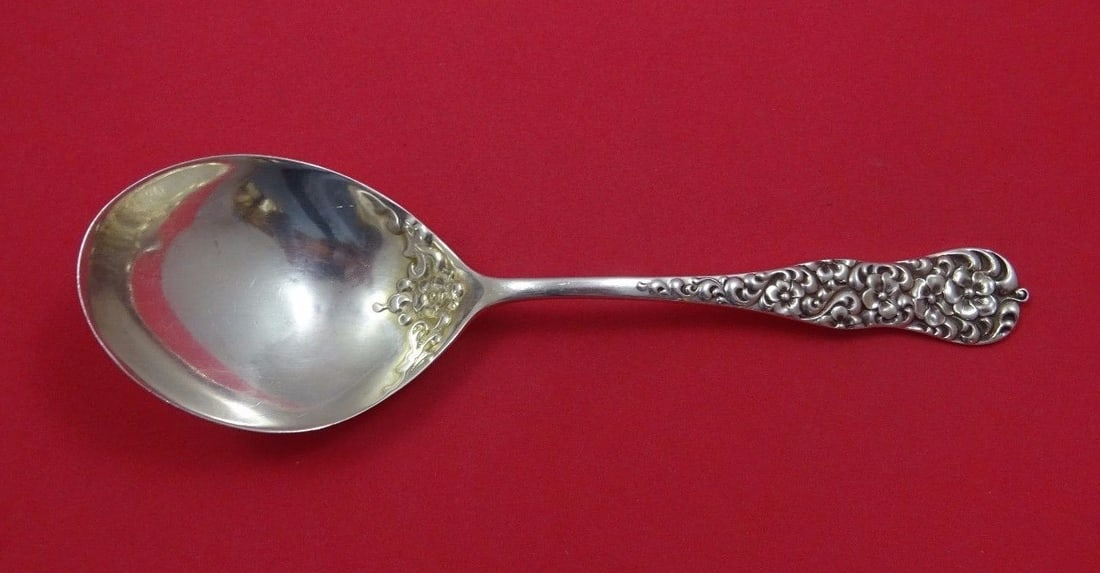 Dominick and Haff Rococo Sterling Silver Serving Spoon 7 1/2: Dominick and Haff Rococo Sterling Silver Serving Spoon 7 1/2 Sterling silver preserve spoon in the Rococo pattern by Dominick & Haff. This serving spoon dates to 1850-1899, was made in the United Stat