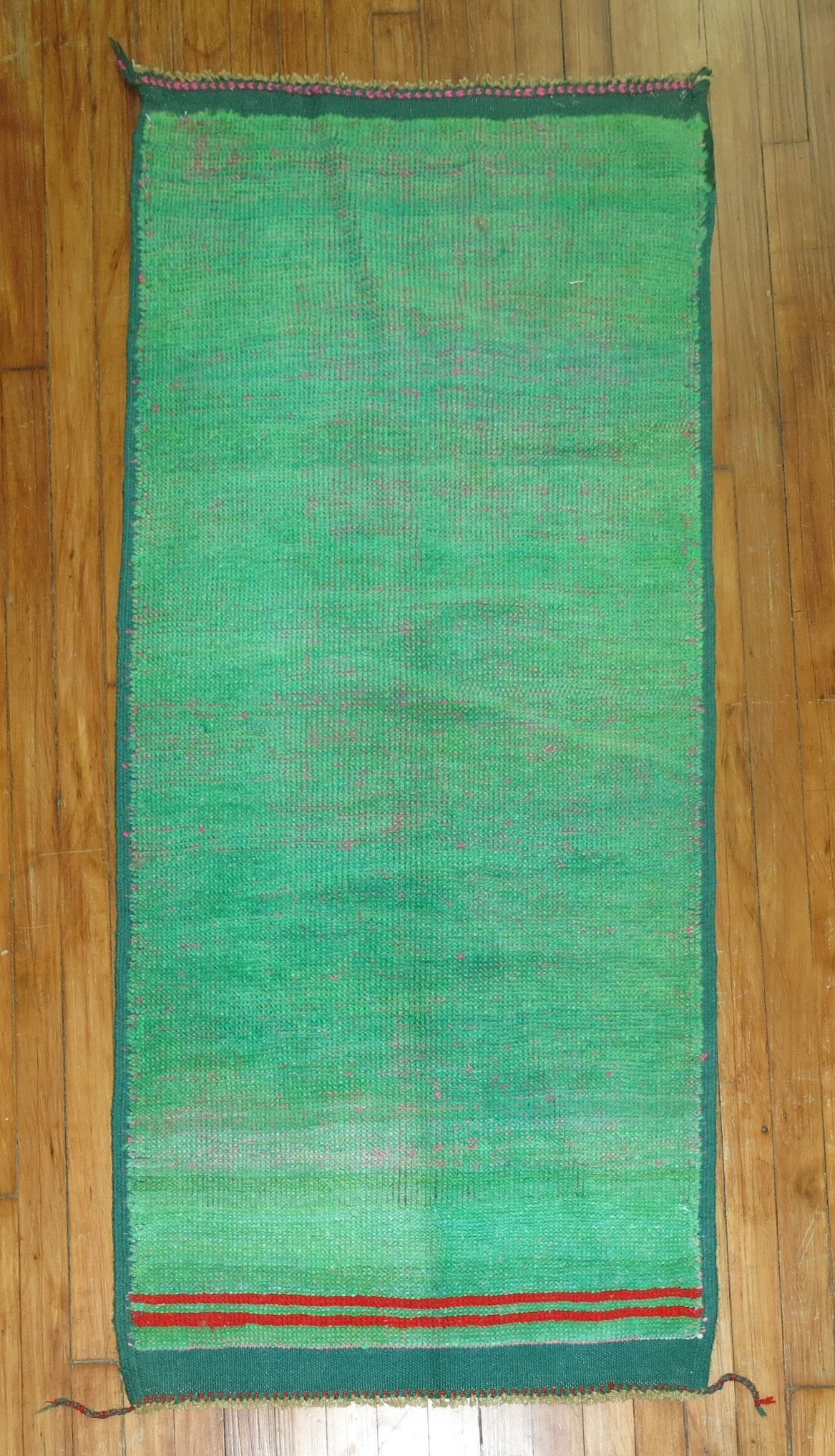 2' 3" x 4' 10" Green Anatolian Small Rug: 2' 3" x 4' 10" Green Anatolian Small Rug Early 20th century Anatolian rug in a green colorway. This pre-owned small rug offers a classic antique look and traditional Anatolian character. Specification