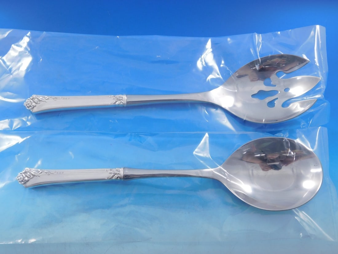 Oneida Damask Rose Sterling Silver Salad Serving Set 10 7/8 Inch: Oneida Damask Rose Sterling Silver Salad Serving Set 10 7/8 Inch Enhance your dining experience with the Damask Rose Salad Serving Set by Oneida. Crafted from sterling silver with hollow handles and s