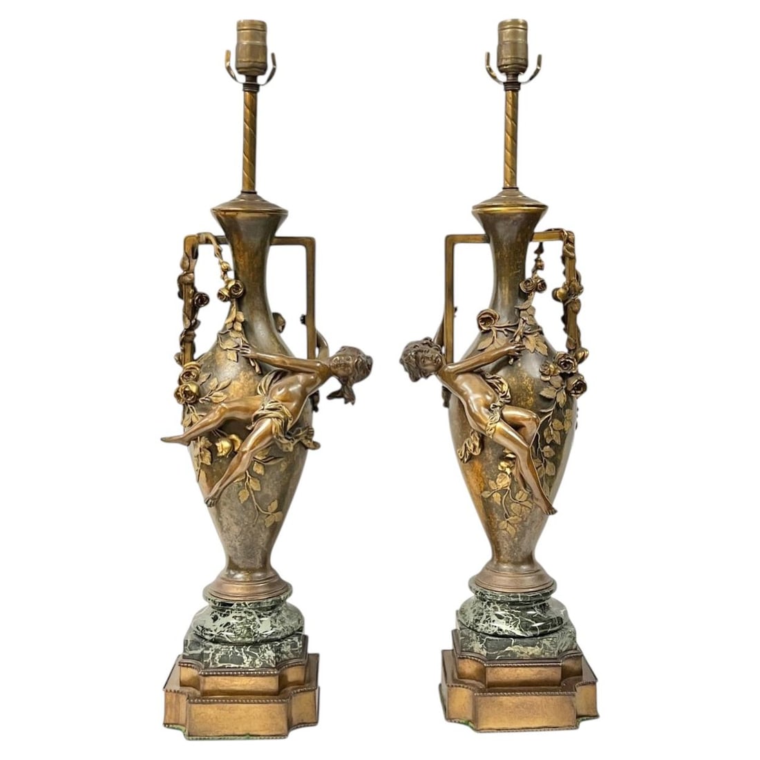 Set of 2 Art Nouveau Bronze Marble Table Lamps after Auguste Moreau: Set of 2 Art Nouveau Bronze Marble Table Lamps after Auguste Moreau Pair of antique Art Nouveau bronze vase table lamps after Auguste Moreau, mounted on variegated green marble pedestals and converted