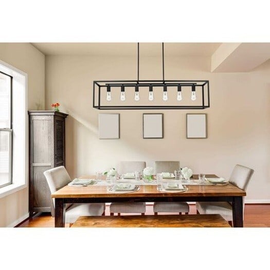 47in Judah 7 Light Black Iron Chandelier Kitchen Island Fixture: 47in Judah 7 Light Black Iron Chandelier Kitchen Island Fixture Farmhouse 7-light chandelier in black finish with a rectangular shade and metal construction. It is hardwired, dimmable, and height-adju