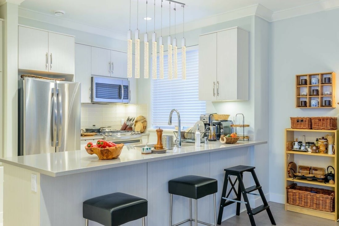 Weston 8 Light Chrome Crystal Pendant 36 in: Weston 8 Light Chrome Crystal Pendant 36 in Modern 8-light crystal pendant chandelier with a chrome finish and clear seeded crystal bar accents. It is hardwired, height-adjustable, and designed for in