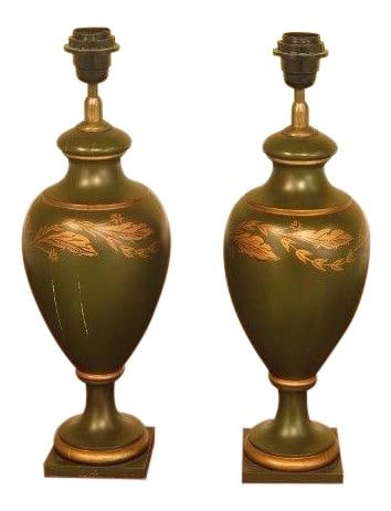 Pair of Gold Wood Urn Lamps Made in Spain: Pair of Gold Wood Urn Lamps Made in Spain This exquisite pair of urn lamps showcases a beautifully decorated wood finish, adding a touch of elegance to any space. Crafted from solid wood and made in S