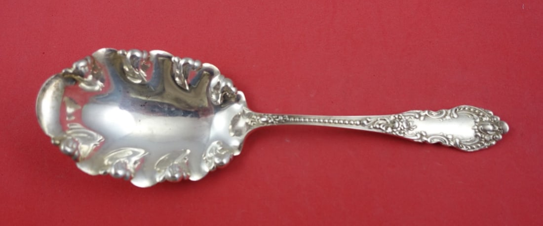 Knowles Mauser Apollo Sterling Silver Ruffled Berry Spoon 7 7/8": Knowles Mauser Apollo Sterling Silver Ruffled Berry Spoon 7 7/8" This exquisite serving spoon is part of the Apollo pattern by Knowles and Mauser, crafted from high-quality sterling silver. Measuring 