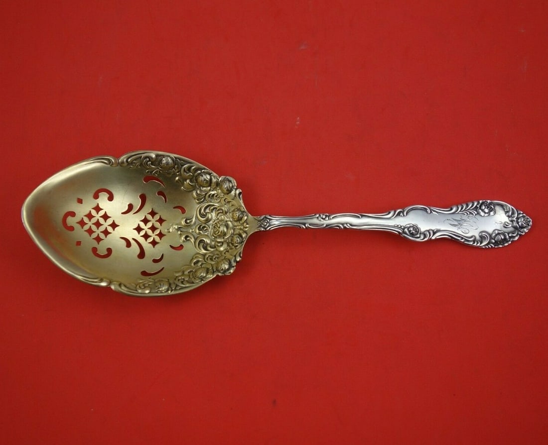 Towle Old English sterling silver ice spoon gold washed 9 1/4 in: Towle Old English sterling silver ice spoon gold washed 9 1/4 in A Towle Old English serving spoon in sterling silver with a gold washed finish. It measures 9 1/4 inches and is monogrammed, with monos