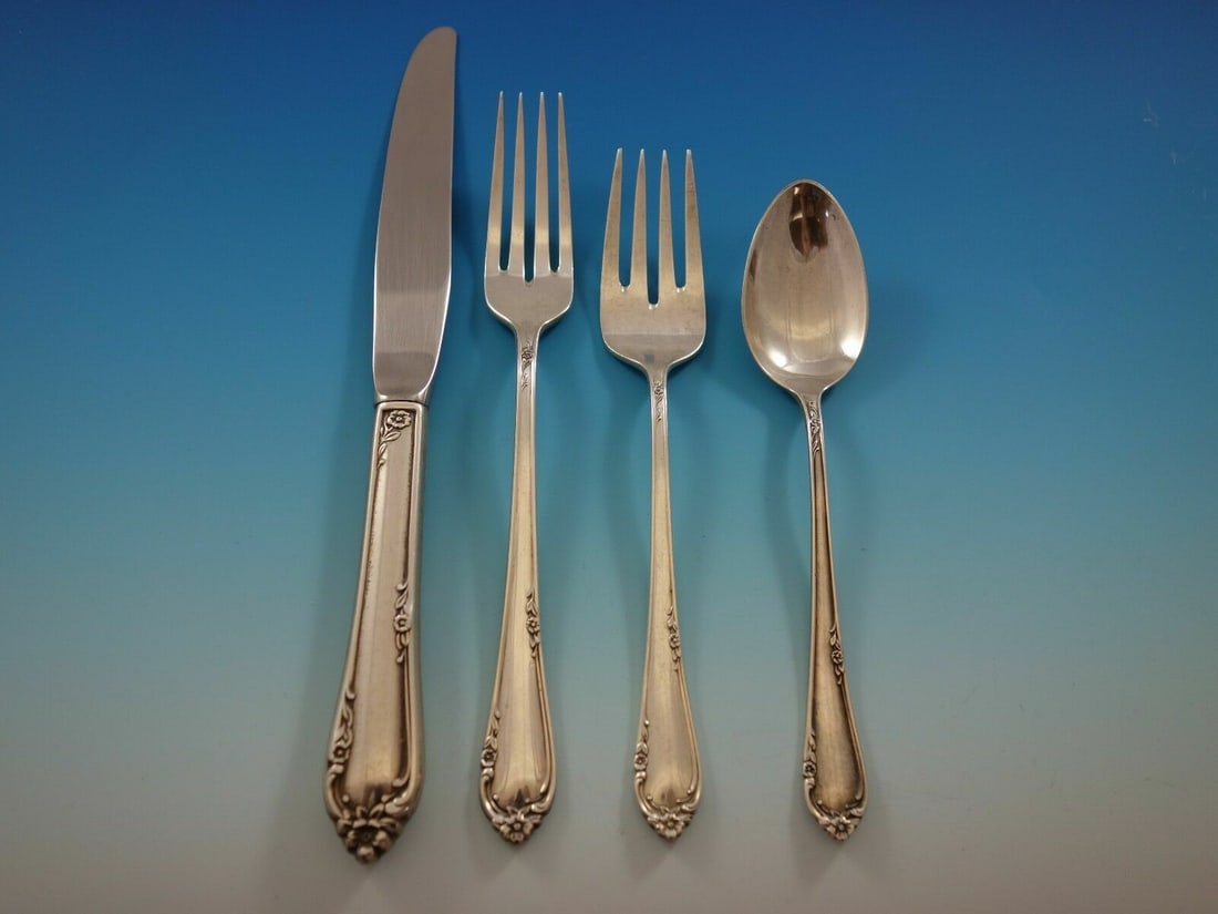 Reed and Barton Dancing Flowers Sterling Silver 4-Piece Place Setting: Reed and Barton Dancing Flowers Sterling Silver 4-Piece Place Setting Elevate your dining experience with this exquisite 4-piece place setting from Reed and Barton, featuring the elegant Dancing Flowe