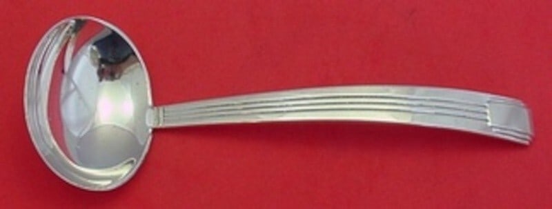 Tiffany & Co Century Sterling Silver Gravy Ladle 7.5 Inches: Tiffany & Co Century Sterling Silver Gravy Ladle 7.5 Inches Experience the elegance of the Century pattern by Tiffany & Co. This exquisite sterling silver gravy ladle measures 7 1/2 inches and showcas