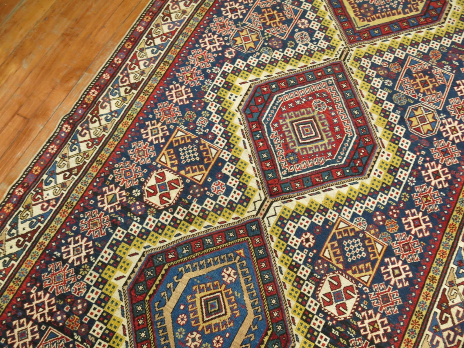4' 9" x 10' 6" Caucasian Shirvan Gallery Runner Rug: 4' 9" x 10' 6" Caucasian Shirvan Gallery Runner Rug Late 19th century Caucasian Shirvan gallery-size rug with a geometric design. This pre-owned wide runner is identified as a Shirvan type and gallery