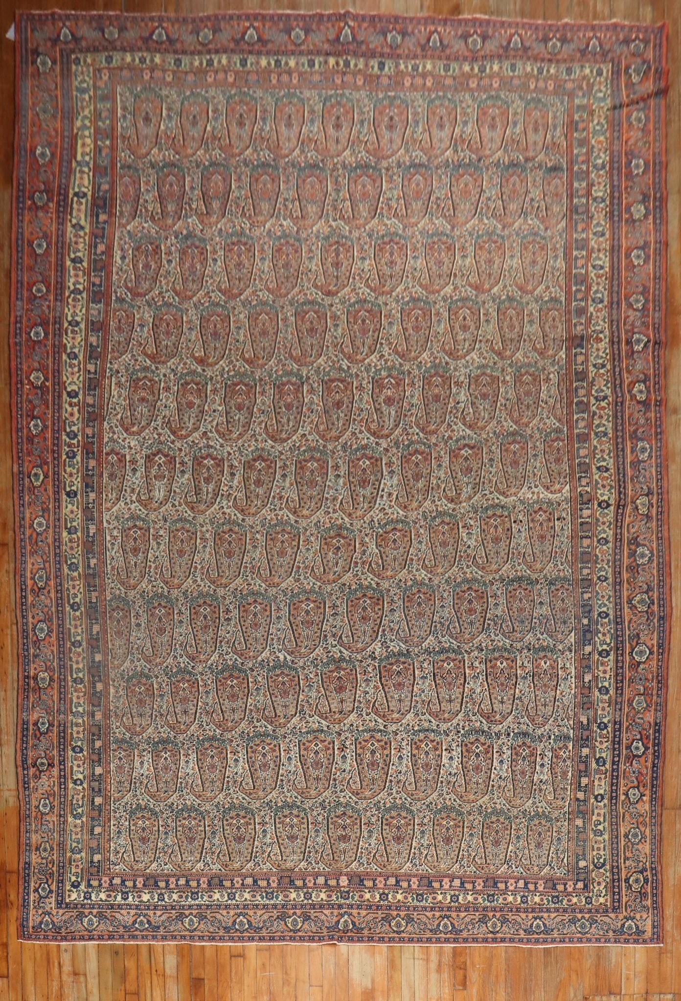 9' 3" x 16' 9" Late 19th Century Senneh Corridor Rug: 9' 3" x 16' 9" Late 19th Century Senneh Corridor Rug Late 19th century Senneh corridor size rug with an all-over paisley design. This pre-owned antique rug offers a classic decorative pattern suited t