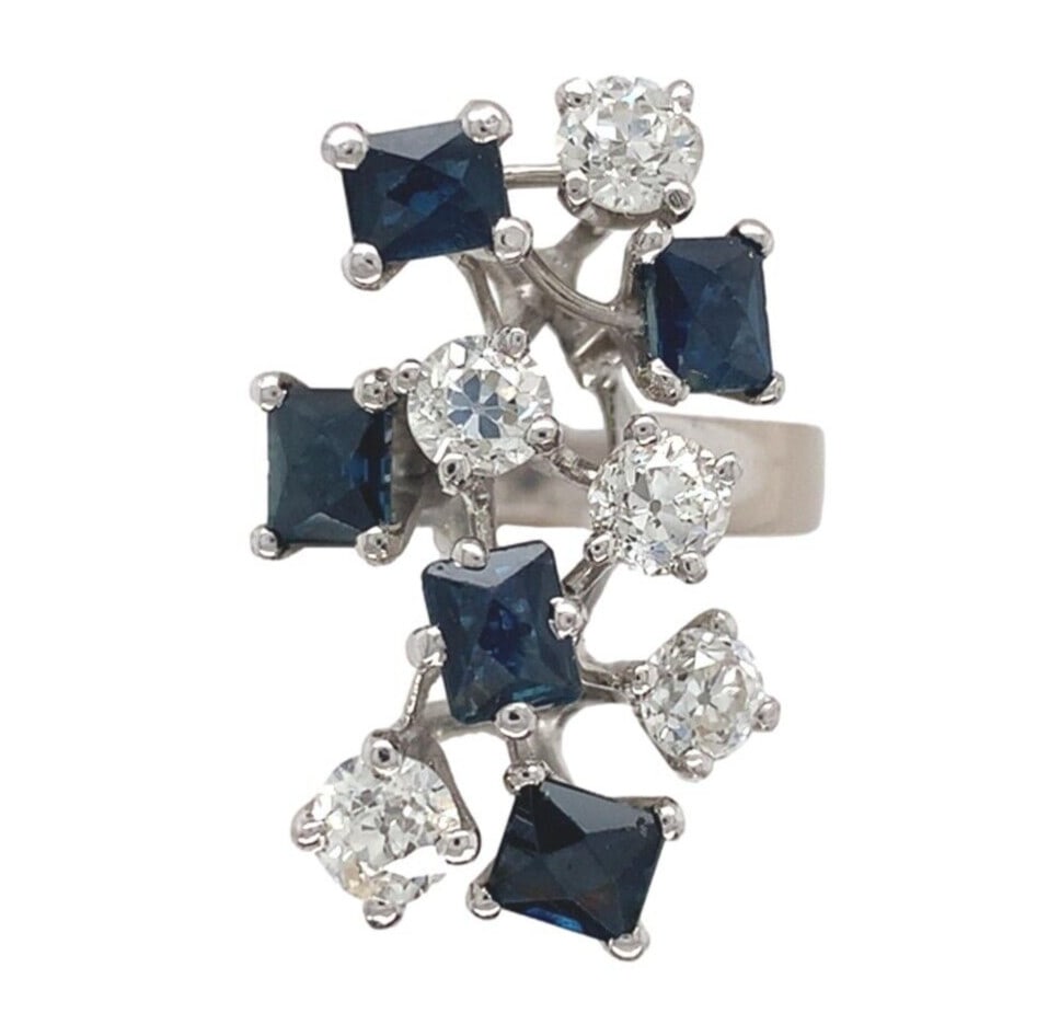 Handmade 18k White Gold Modernist Sapphire Diamond Ring 1950s: Handmade 18k White Gold Modernist Sapphire Diamond Ring 1950s This exquisite 18k white gold ring features a modernist design adorned with genuine natural sapphires and diamonds. The ring showcases fiv