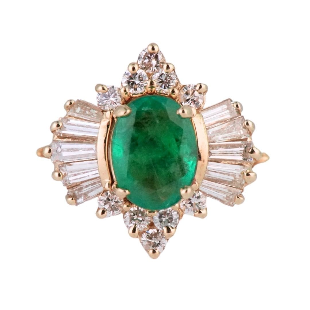 Oval Emerald and Diamond Ring in 14K Yellow Gold Size 6: Oval Emerald and Diamond Ring in 14K Yellow Gold Size 6 Classic 14K yellow gold ring featuring a natural oval emerald accented by baguette-cut and round brilliant diamonds. This pre-owned piece is in 