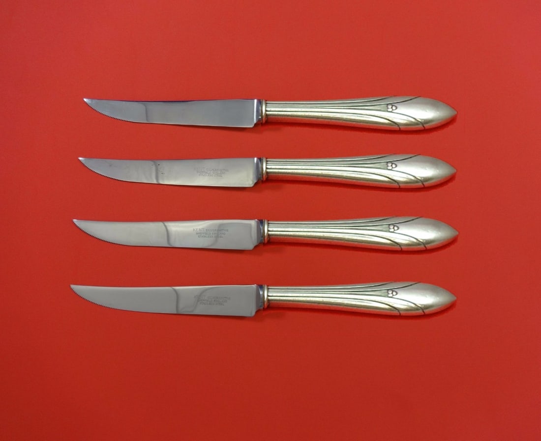 Elsinore International Sterling Silver Steak Knife Set 4pc Hollow Handle: Elsinore International Sterling Silver Steak Knife Set 4pc Hollow Handle Enhance your dining experience with this exquisite 4-piece steak knife set from the Elsinore pattern by International. Crafted 
