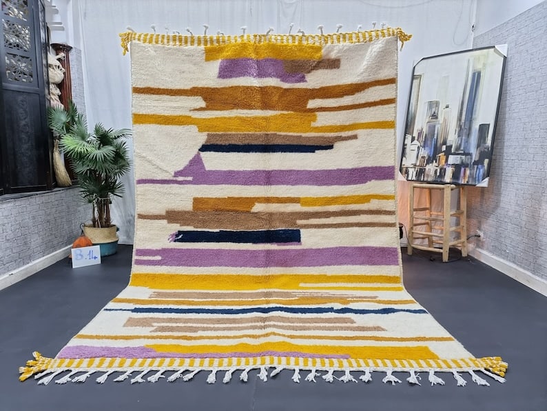 Authentic Handwoven Colorful Rug 10 x 6.56 Feet Morocco: Authentic Handwoven Colorful Rug 10 x 6.56 Feet Morocco This authentic colorful rug is handwoven by local Berber women weavers in the Atlas Mountains of Morocco. Crafted using traditional techniques, 