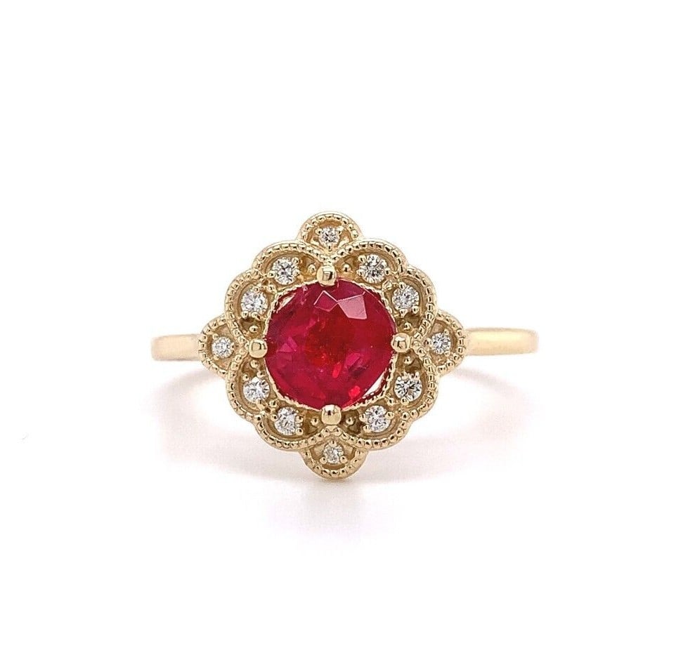 14k Yellow Gold Jedi Red Spinel Diamond Ring GIA Certified: 14k Yellow Gold Jedi Red Spinel Diamond Ring GIA Certified This stunning 14k Yellow Gold ring showcases a .77ct Jedi Red Spinel and twelve round diamond accents. The centerpiece, a cushion-cut Jedi Re