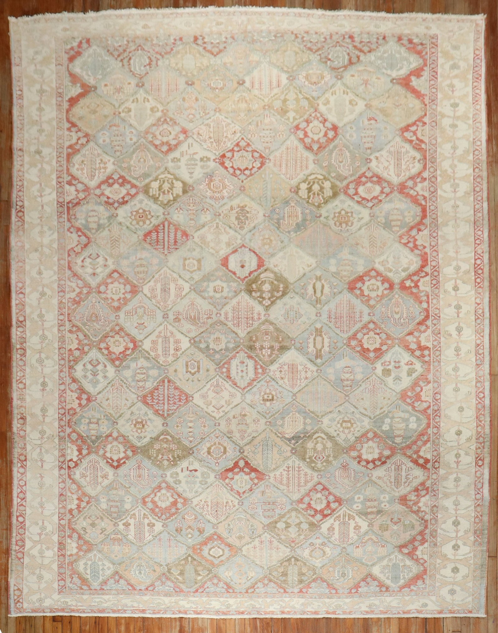 10' x 13' 8" Persian Bakhtiari Room Carpet Garden Motif: 10' x 13' 8" Persian Bakhtiari Room Carpet Garden Motif Early 20th century Persian Bakhtiari carpet featuring an all-over garden design motif. This pre-owned room-size carpet reflects the traditional 