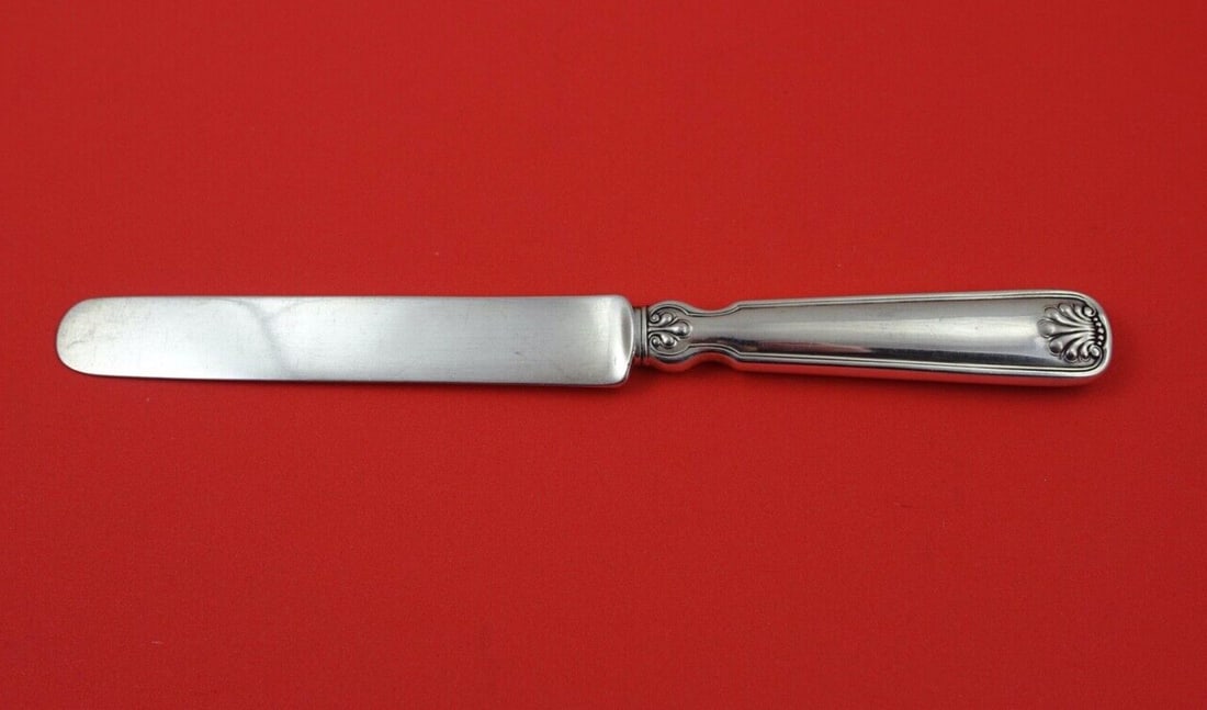 Tiffany & Co. Shell & Thread Sterling Silver Dessert Knife 7.5": Tiffany & Co. Shell & Thread Sterling Silver Dessert Knife 7.5" This exquisite dessert knife/tea knife from Tiffany & Co. features the elegant Shell & Thread pattern, showcasing the brand's renowned c