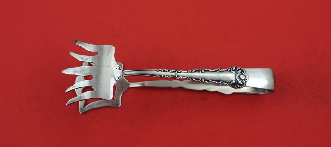 Frank Whiting Kings Court Sterling Silver Pastry Tong 5.5": Frank Whiting Kings Court Sterling Silver Pastry Tong 5.5" Elevate your serving experience with this exquisite pastry tong from the Kings Court pattern by Frank Whiting. Crafted from high-quality
