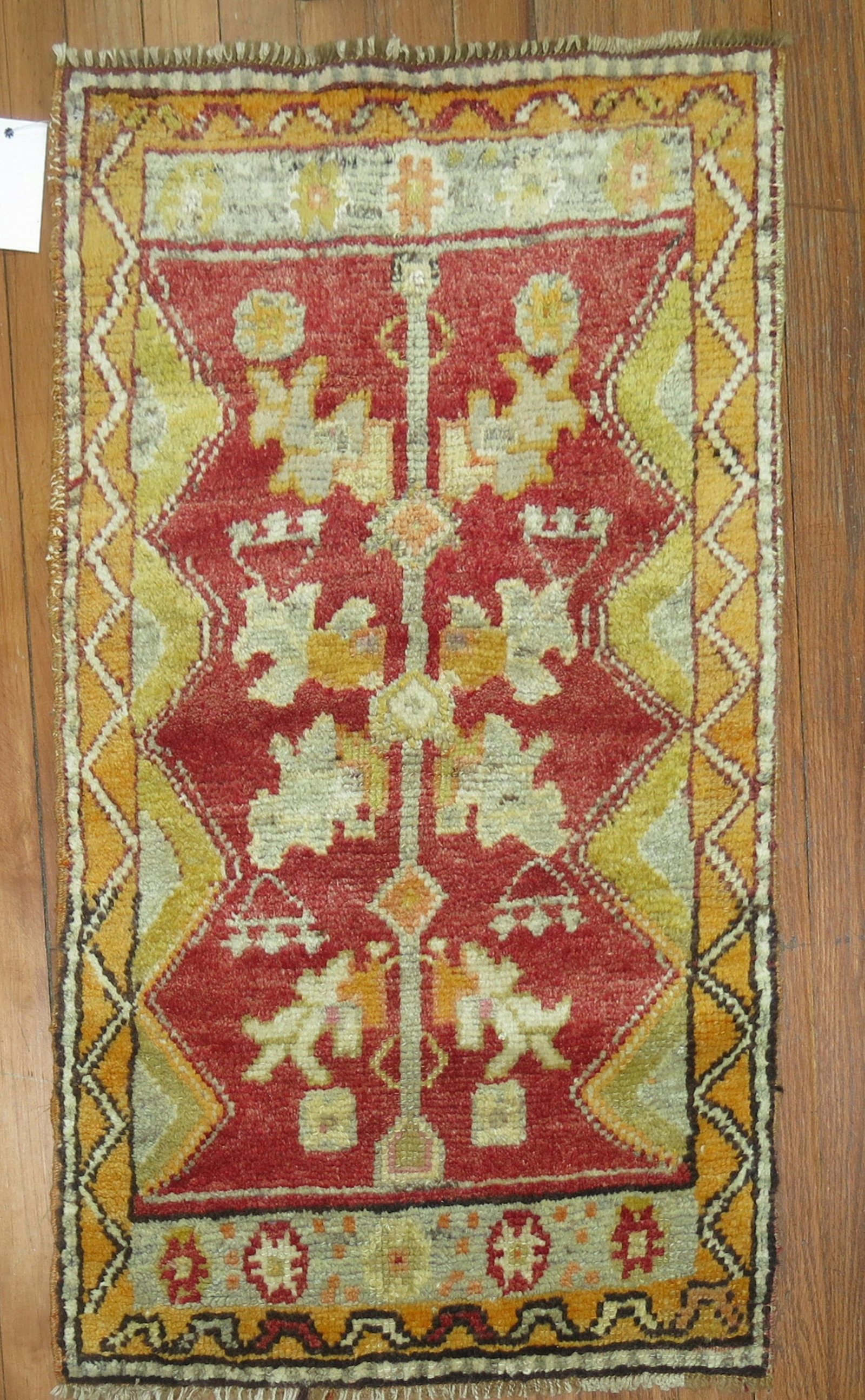 1' 10" x 3' Turkish Yastik Rug Red Anatolian: 1' 10" x 3' Turkish Yastik Rug Red Anatolian 20th century Turkish Anatolian yastik rug in a small format, featuring a red field and a geometric woven design. Pre-owned. Specifications Item Type: Rug S
