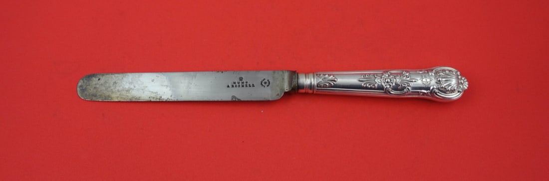 Hunt & Ruskell Queen Pattern Sterling Silver Dinner Knife 10 3/4": Hunt & Ruskell Queen Pattern Sterling Silver Dinner Knife 10 3/4" Discover a stunning piece of history with this Queens by Hunt & Ruskell sterling silver dinner knife. Crafted in the elegant Queen pat