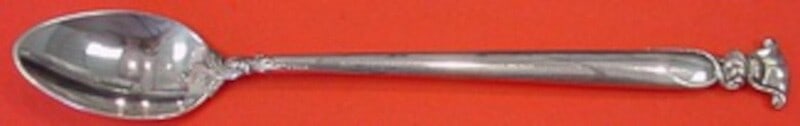 Wallace Romance of the Sea Sterling Silver Iced Tea Spoon 7 3/4": Wallace Romance of the Sea Sterling Silver Iced Tea Spoon 7 3/4" This exquisite iced tea spoon features the elegant "Romance of the Sea" pattern by Wallace, crafted from high-quality sterling silver. 