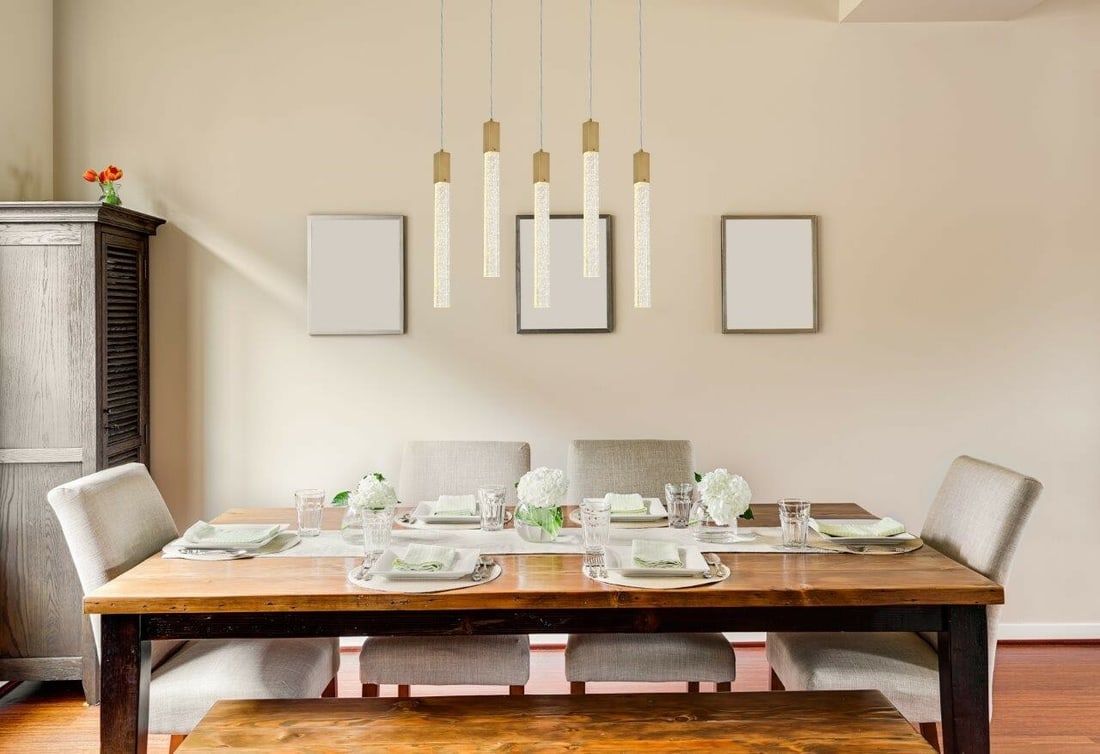 Weston 36 Inch Satin Gold Crystal Pendant Chandelier 5 Light: Weston 36 Inch Satin Gold Crystal Pendant Chandelier 5 Light This modern pendant chandelier from the Weston Collection features a sleek, rectangular design with clear seeded crystal bars and a satin g