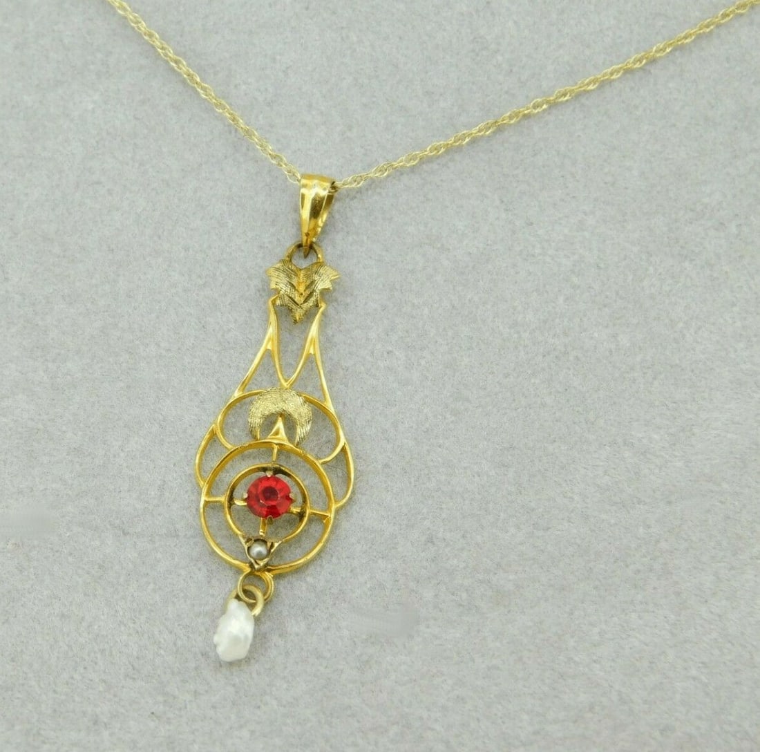 Victorian 10k Yellow Gold Lavaliere Pendant Red Glass Pearl Drop: Victorian 10k Yellow Gold Lavaliere Pendant Red Glass Pearl Drop This exquisite 10k yellow gold lavaliere pendant embodies Victorian elegance, featuring a stunning red glass paste stone and a delicate