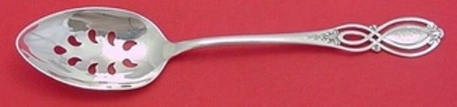 Alvin Chippendale Old sterling silver 8in slotted serving spoon: Alvin Chippendale Old sterling silver 8in slotted serving spoon A post-1940 Alvin serving spoon in the Chippendale Old pattern, made in the United States from sterling silver. This custom-made pierced
