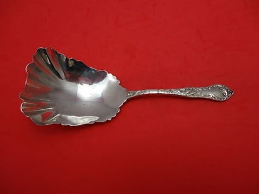 Antique Blackinton Lotus Sterling Silver Cracker Scoop 9" 1901 Serving Piece: Antique Blackinton Lotus Sterling Silver Cracker Scoop 9" 1901 Serving Piece Discover the elegance of this antique Sterling Silver Cracker Scoop by Blackinton, dating back to 1901. This 9-inch serving