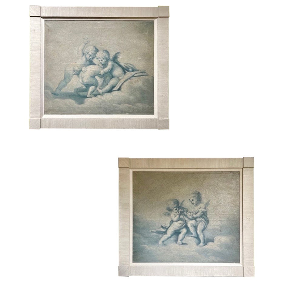 19th Century French Baroque Pair of Putti Paintings Set of 2 Blue & White: 19th Century French Baroque Pair of Putti Paintings Set of 2 Blue & White This exquisite pair of 19th-century French paintings showcases playful putti, or cherubic children, in a Baroque-inspired styl