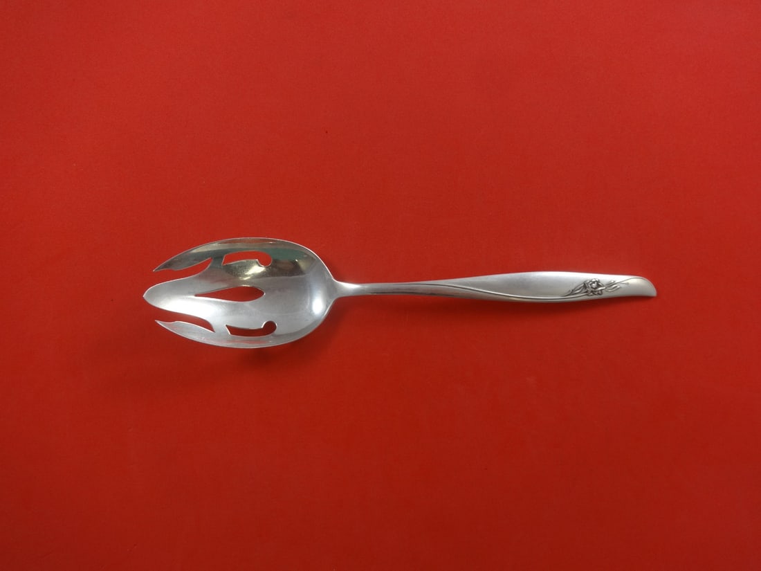 Gorham Sea Rose Sterling Silver Slotted Serving Spoon 8.5": Gorham Sea Rose Sterling Silver Slotted Serving Spoon 8.5" Introducing the exquisite Sea Rose Serving Spoon by Gorham, crafted from high-quality sterling silver. This beautiful slotted spoon features 