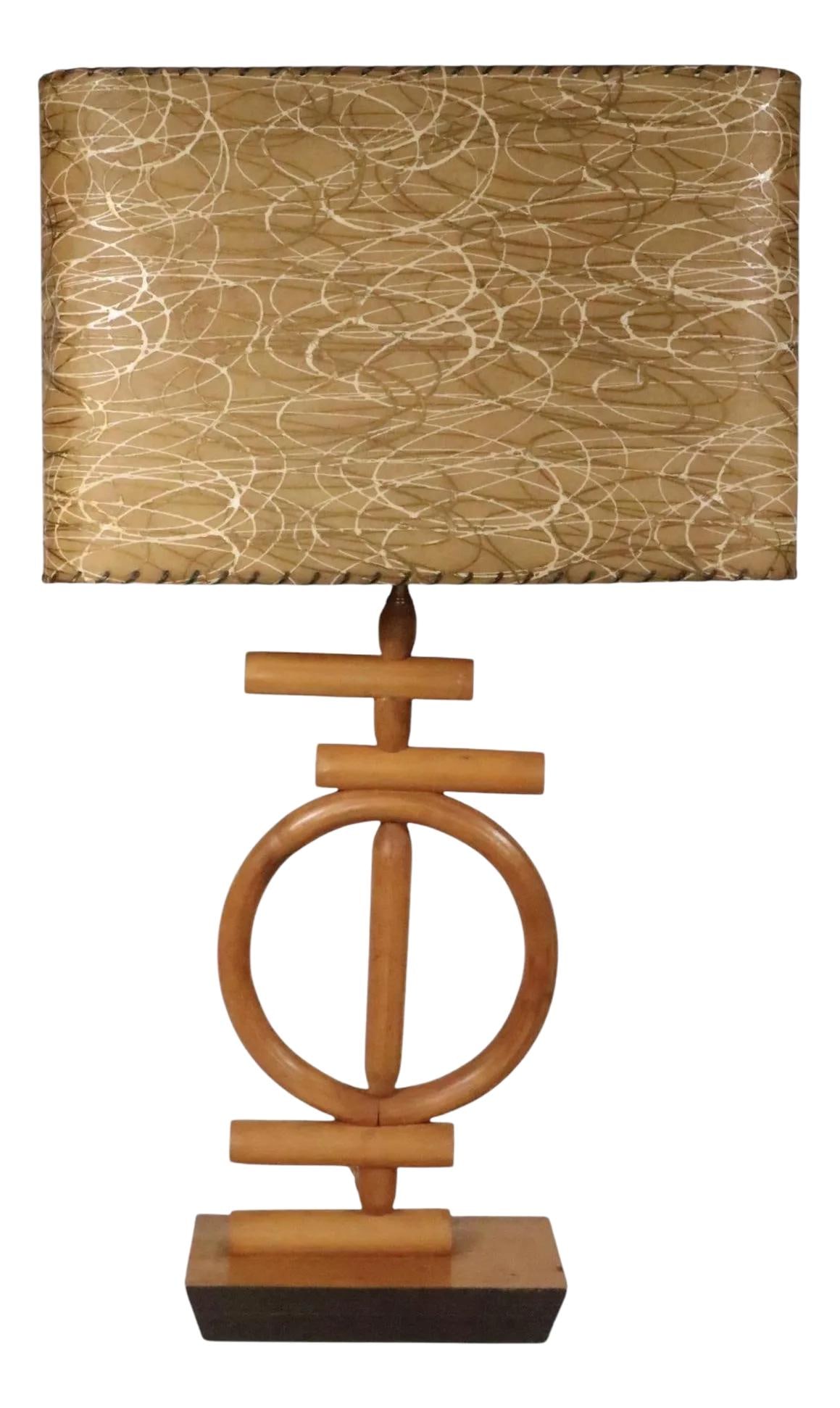 Chic Mid Century Bamboo Table Lamp with Original Wandering Shade: Chic Mid Century Bamboo Table Lamp with Original Wandering Shade Illuminate your space with this chic Mid Century bamboo table lamp, embodying a stylish Tiki aesthetic. This unique piece showcases an 