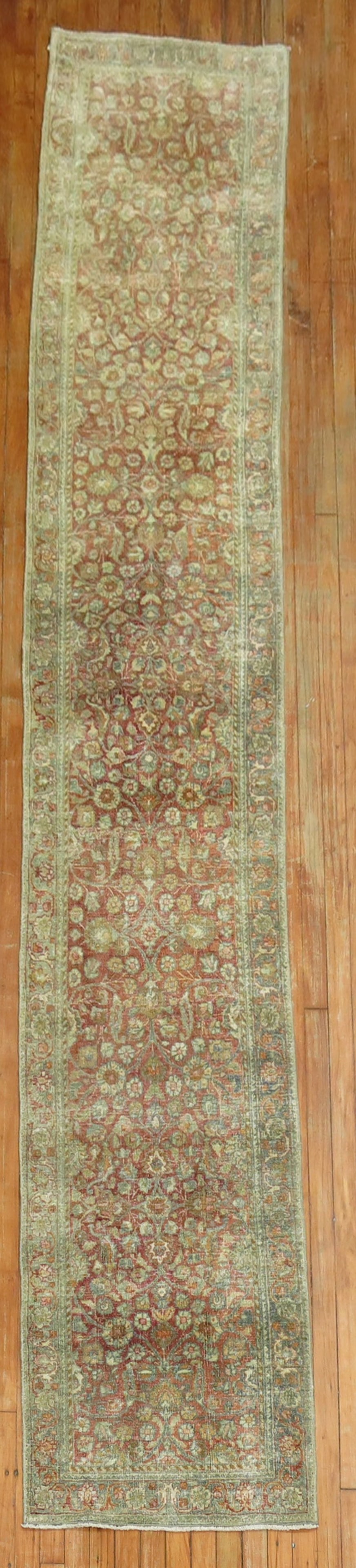 2' 3" x 12' 10" Narrow Kashan Persian Runner circa 1930: 2' 3" x 12' 10" Narrow Kashan Persian Runner circa 1930 Narrow Persian Kashan runner, circa 1930, featuring an intricate floral pattern. This pre-owned runner is identified as a Kashan rug in a shabby