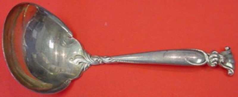 Wallace Romance of the Sea Sterling Silver Gravy Ladle 6 3/4": Wallace Romance of the Sea Sterling Silver Gravy Ladle 6 3/4" This exquisite gravy ladle by Wallace features the elegant "Romance of the Sea" pattern. Crafted from high-quality sterling silver, this p