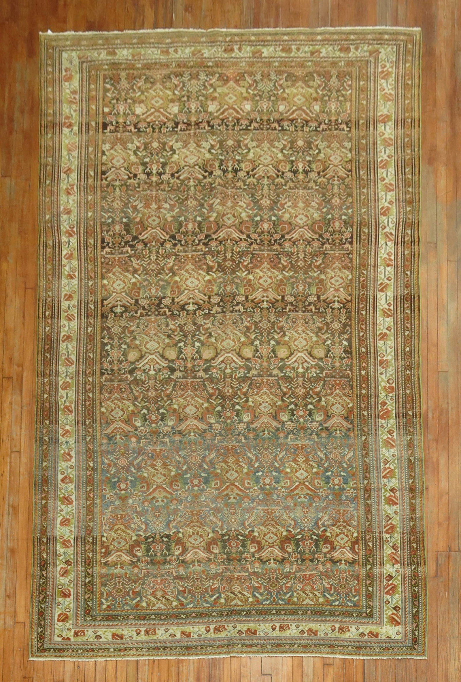 7' 4" x 12' 4" Persian Malayer Room Rug Earth Tones: 7' 4" x 12' 4" Persian Malayer Room Rug Earth Tones Antique Persian Malayer rug from the 20th century, featuring an earth-tone palette and a room-size format. This pre-owned piece is identified as a M