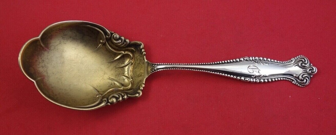 Towle Canterbury Sterling Silver Preserve Spoon Gold Washed 7 7/8: Towle Canterbury Sterling Silver Preserve Spoon Gold Washed 7 7/8 This Towle Canterbury preserve spoon is made of sterling silver with a gold-washed finish. It is monogrammed, with monos varying, and 