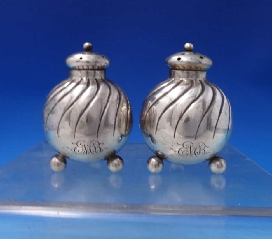 Dominick & Haff Sterling Silver Salt Pepper Shaker Set 2pc Swirl Design: Dominick & Haff Sterling Silver Salt Pepper Shaker Set 2pc Swirl Design This exquisite two-piece salt and pepper shaker set by Dominick & Haff is crafted from high-quality sterling silver (.925) and f