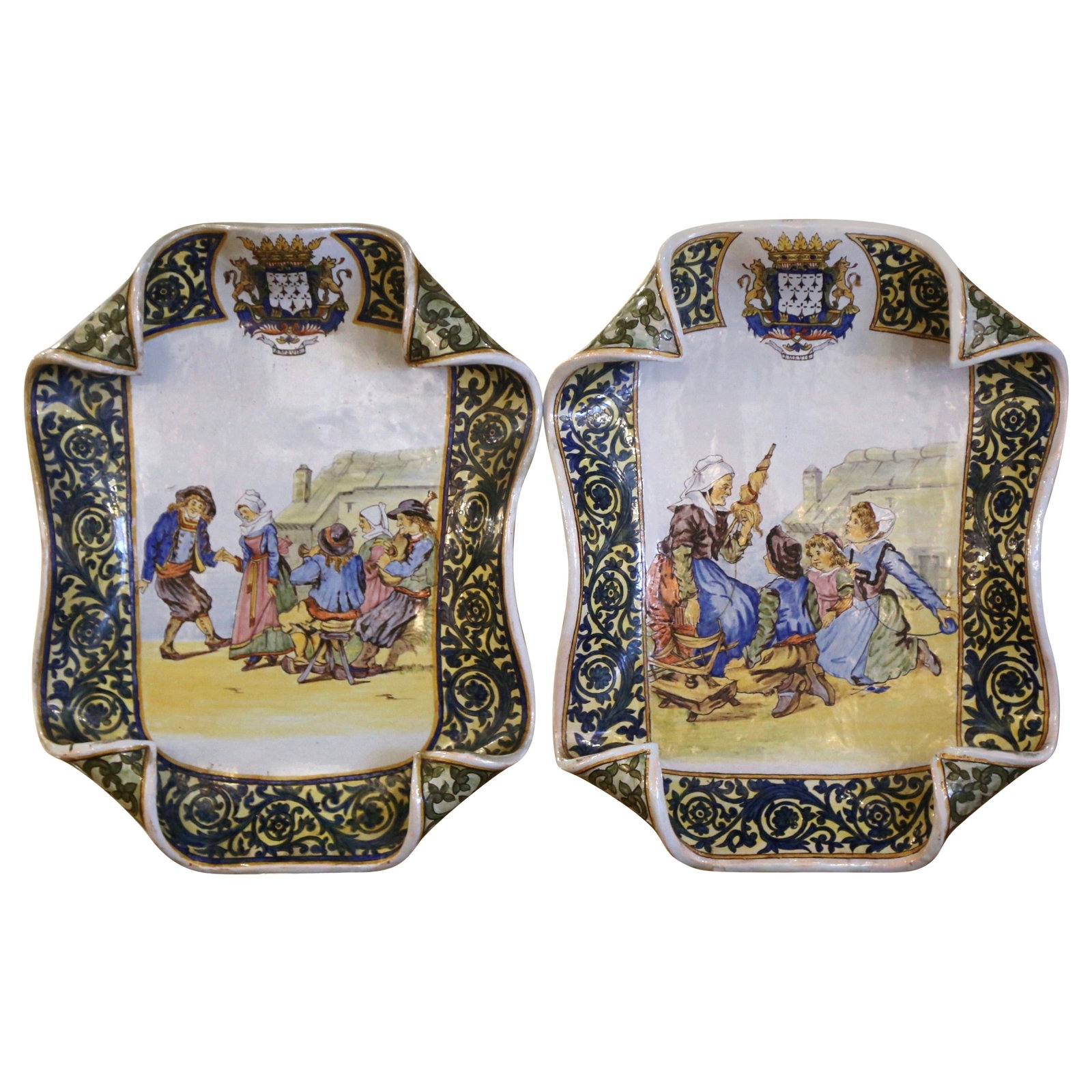 Set of 2 Quimper Porquier-Beau Faience Wall Platters with Breton Figures: Set of 2 Quimper Porquier-Beau Faience Wall Platters with Breton Figures This pair of late 19th century French Quimper Porquier-Beau faience wall platters features hand-painted scenes celebrating Bret