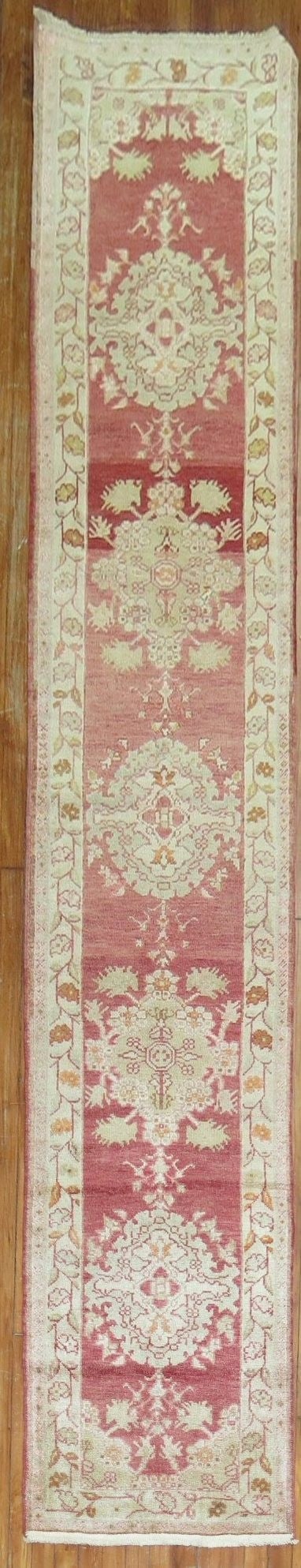 2' 1" x 11' 9" Turkish Sivas narrow runner rug: 2' 1" x 11' 9" Turkish Sivas narrow runner rug Early 20th century Turkish Sivas narrow runner in a red colorway. This pre-owned runner features the Sivas type and elongated runner form. Specifications