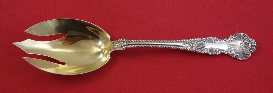 Gorham Cambridge Sterling Salad Serving Fork Gold Wash 8 3/4: Gorham Cambridge Sterling Salad Serving Fork Gold Wash 8 3/4 Sterling silver salad serving fork in the Cambridge pattern by Gorham, with gold wash and an 8 3/4 inch length. It is monogrammed (monos va