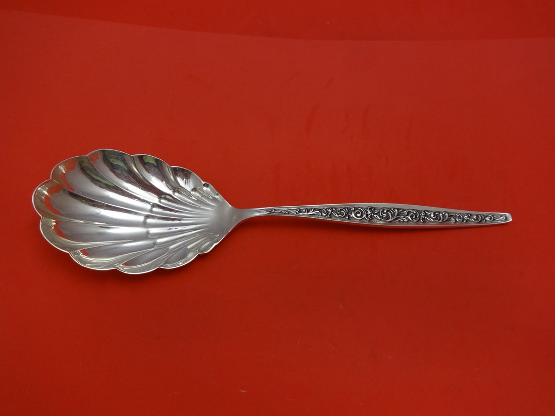 Sterling Silver Berry Spoon Reed Barton Renaissance Scroll 9 1/8": Sterling Silver Berry Spoon Reed Barton Renaissance Scroll 9 1/8" Sterling silver berry spoon in the Renaissance Scroll pattern by Reed & Barton. It is not monogrammed and is in excellent pre-owned co