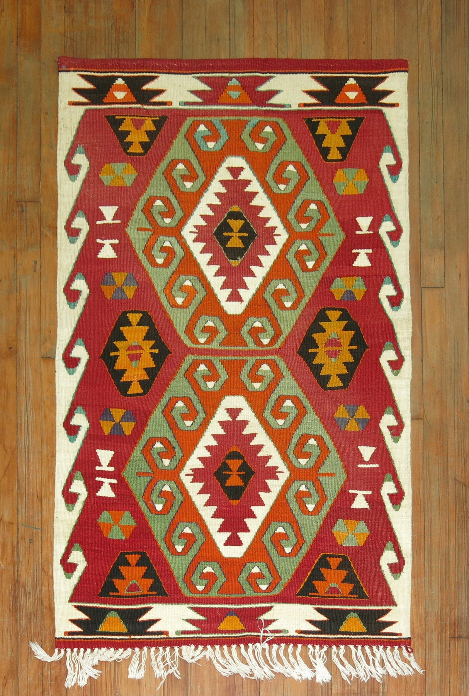 2' 10" x 4' 7" Turkish Kilim Throw Rug Mid 20th Century: 2' 10" x 4' 7" Turkish Kilim Throw Rug Mid 20th Century Mid 20th century Turkish kilim throw rug with a colorful geometric design. This pre-owned small rug is woven in a traditional flatweave style an