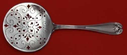 Tiffany & Co Colonial Sterling Silver Pierced Tomato Server 7 7/8": Tiffany & Co Colonial Sterling Silver Pierced Tomato Server 7 7/8" Enhance your dining experience with this exquisite Colonial tomato server by Tiffany & Co. Crafted from high-quality sterling silver,