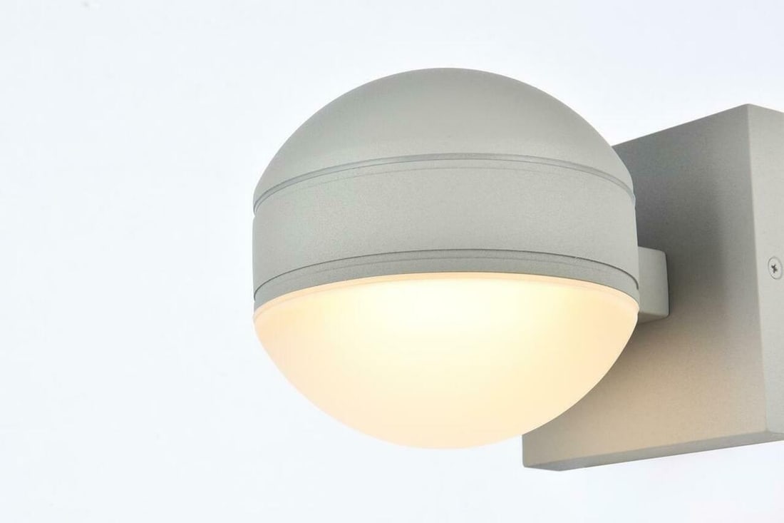 Living District Raine Silver LED Outdoor Wall Sconce: Living District Raine Silver LED Outdoor Wall Sconce This modern outdoor wall sconce features an integrated 8W LED light, delivering 350 lumens with a warm 3000K color temperature. Designed for outdoo