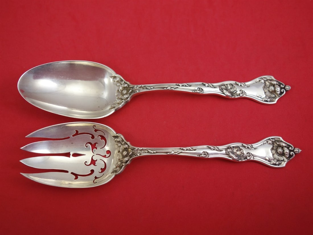 Reed and Barton Intaglio Sterling Silver Vegetable Serving Set 2pc Poppy Motif: Reed and Barton Intaglio Sterling Silver Vegetable Serving Set 2pc Poppy Motif Enhance your dining experience with this elegant 2-piece vegetable serving set from Reed and Barton, crafted in fine ster