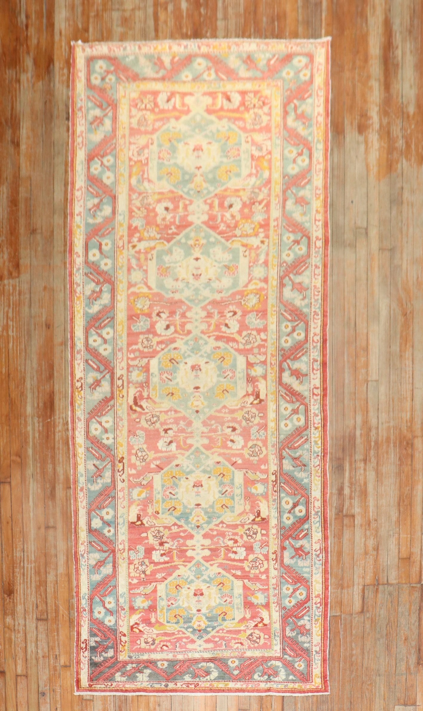 4' 3" x 10' 11" Turkish Ghiordes floral runner rug: 4' 3" x 10' 11" Turkish Ghiordes floral runner rug Early 20th century Turkish Ghiordes floral wide runner in a pre-owned condition. Specifications Origin: Turkish Type: Ghiordes Category: Runner Style