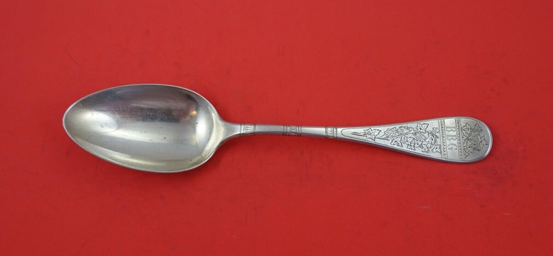 Tiffany Co King William Engraved Sterling Silver Serving Spoon 8 3/8: Tiffany Co King William Engraved Sterling Silver Serving Spoon 8 3/8 Sterling silver serving spoon in the King William Engraved pattern by Tiffany & Co. It features a grape motif, is monogrammed with 