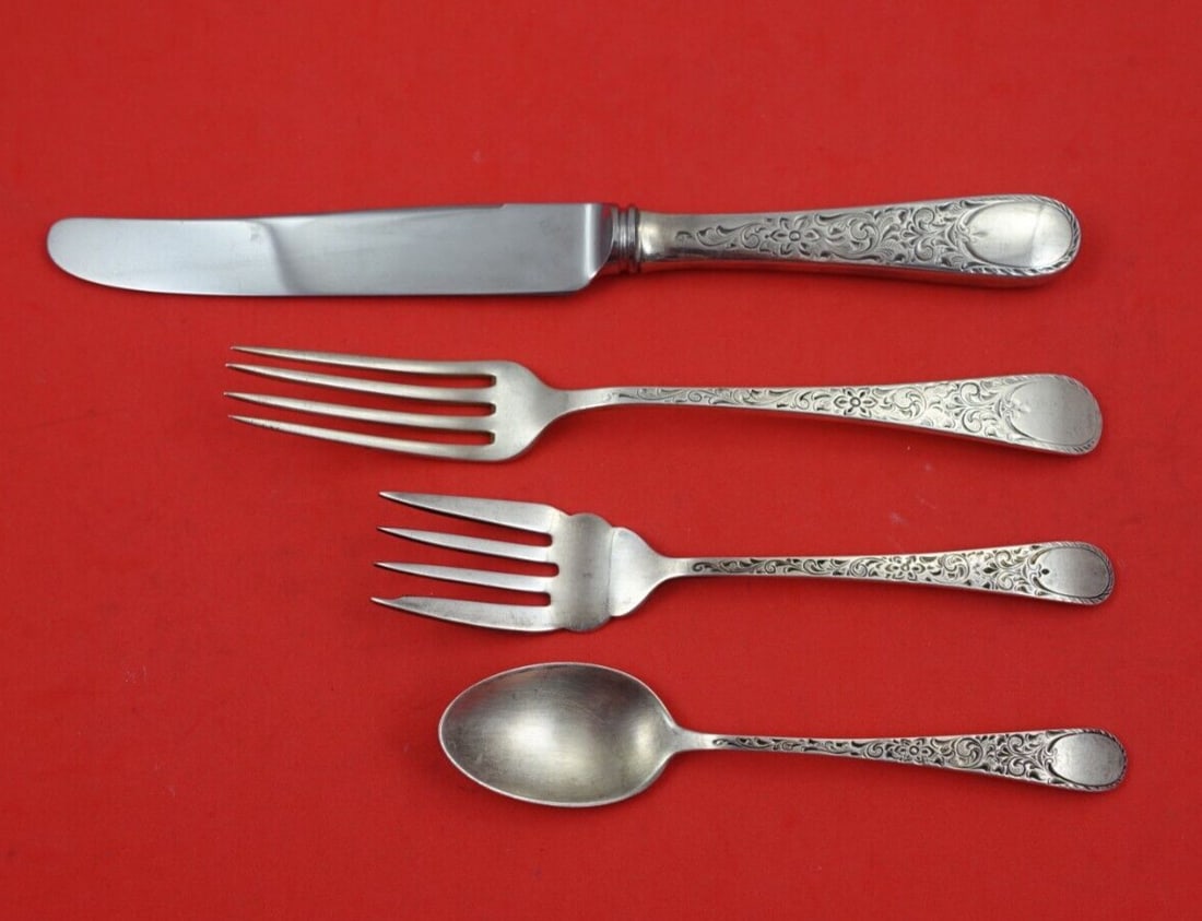 4 Piece Sterling Place Setting Birks London Engraved Regular Size: 4 Piece Sterling Place Setting Birks London Engraved Regular Size A 4-piece regular size place setting in the London Engraved pattern by Birks. The set is made of sterling silver and includes a regula