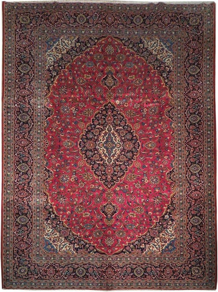 10' x 13.6' Hand-Knotted Red Persian Kashan Rug Wool Silk: 10' x 13.6' Hand-Knotted Red Persian Kashan Rug Wool Silk Free continental US Shipping Experience the elegance of our 10 x 13.6 Red Persian Kashan Rug, a stunning centerpiece crafted by skilled artisa