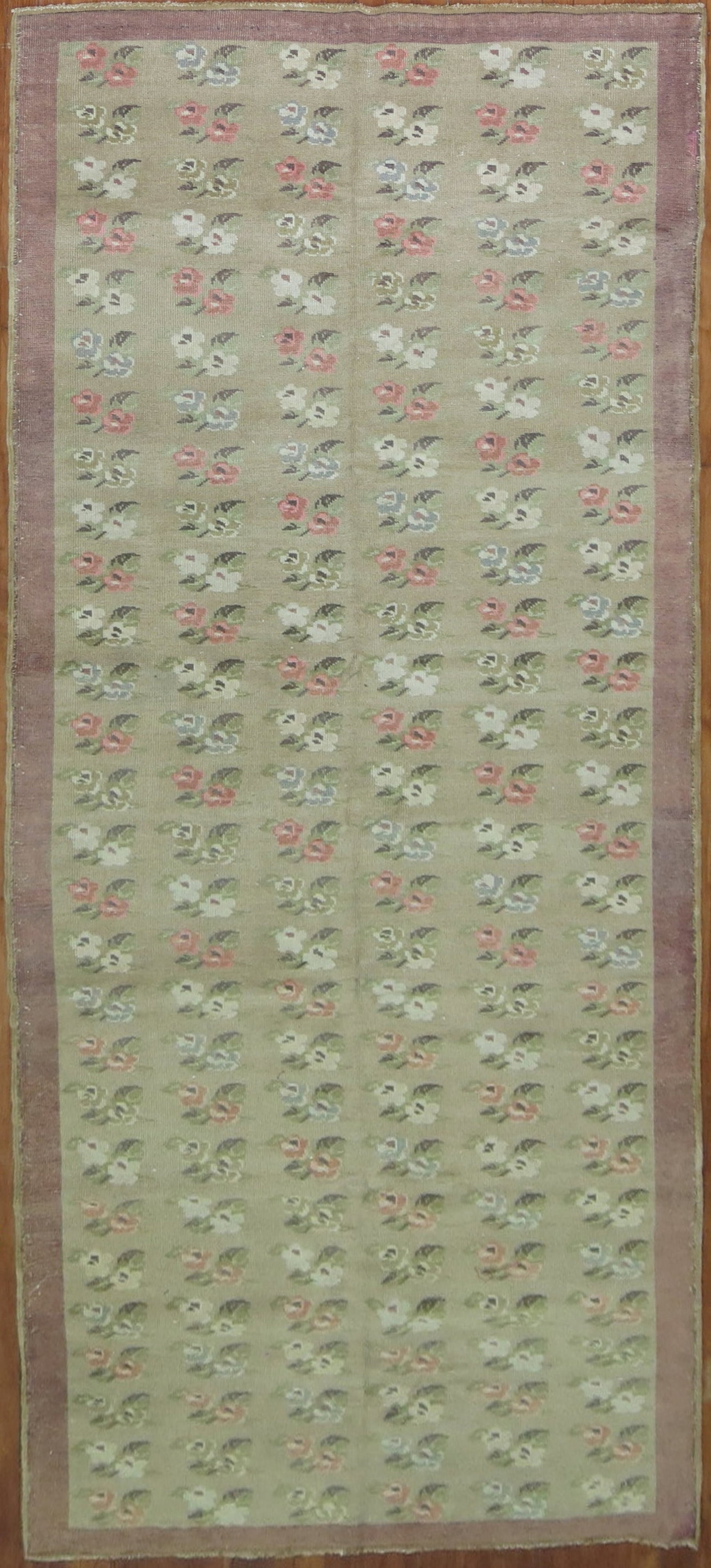 4' 3" x 11' 3" Konya Turkish Gallery Runner with Floral Design: 4' 3" x 11' 3" Konya Turkish Gallery Runner with Floral Design Mid 20th century Turkish floral gallery runner in the Konya type. This pre-owned rug features a floral design and elongated gallery runne