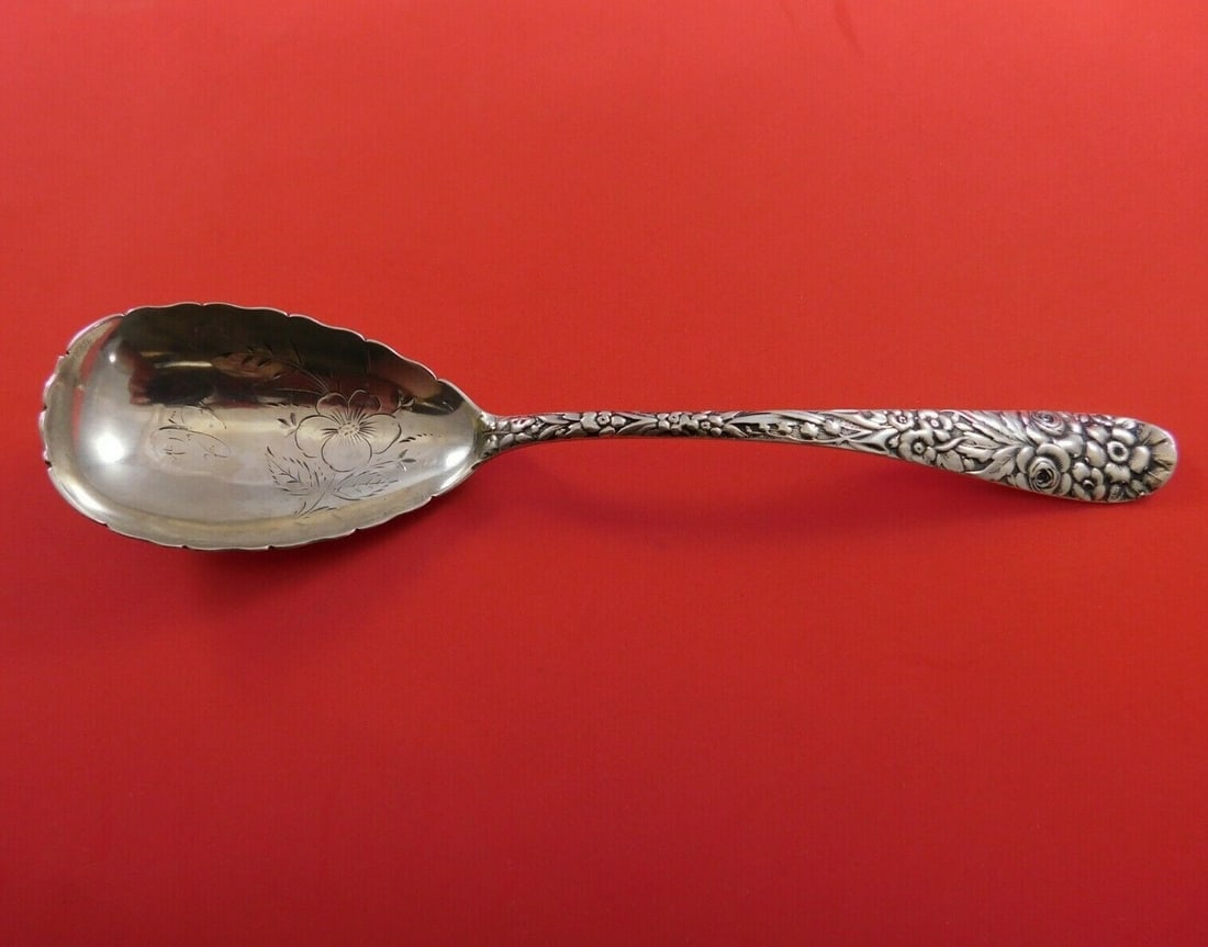 James R Armiger Sterling Silver Repousse Berry Spoon Flower Motif 8.5in: James R Armiger Sterling Silver Repousse Berry Spoon Flower Motif 8.5in This exquisite berry spoon is crafted from high-quality sterling silver and features a beautifully scalloped edge and an intrica
